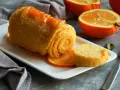 Pomarańczowy deser z cukrową skórką i plastrami pomarańczy. Tak można wykorzystać pomarańcze!